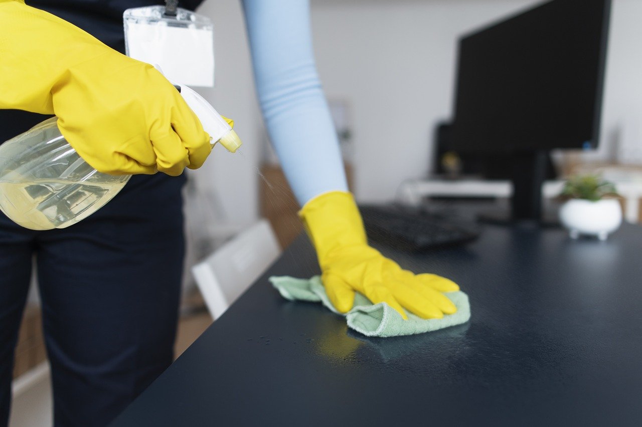 Cleaning table in office